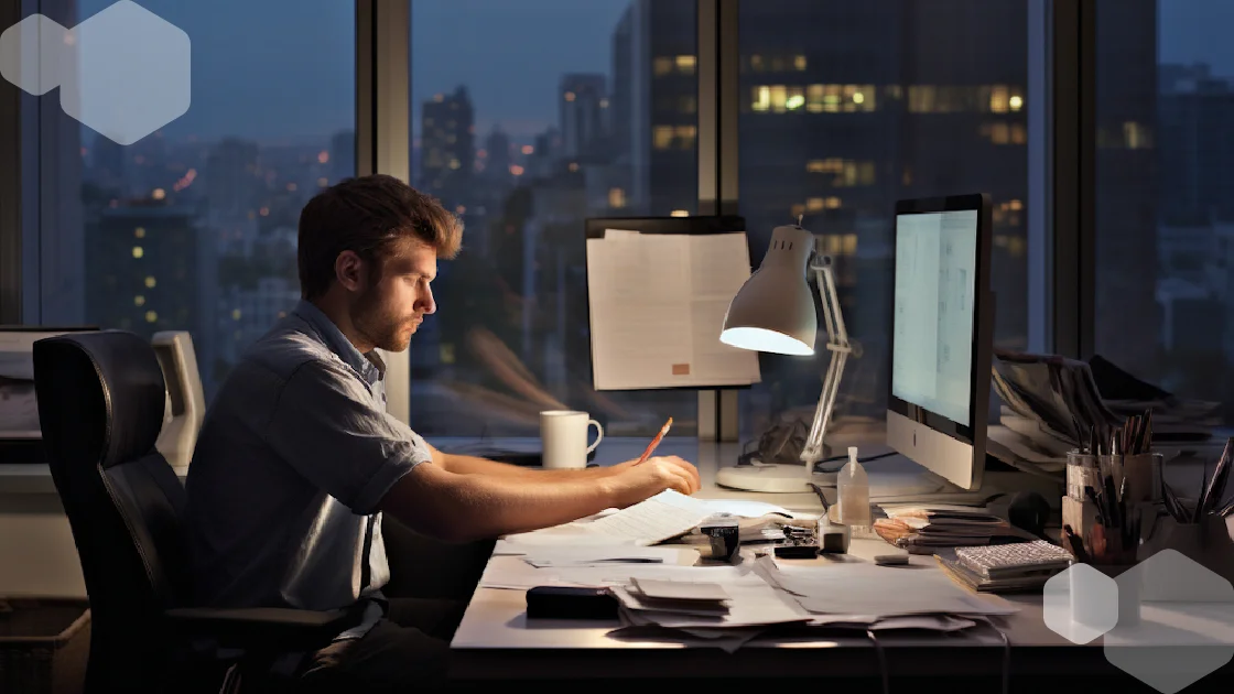 Professional working late in a high-rise office, highlighting the behind-the-scenes effort involved in diverse transcription use cases.