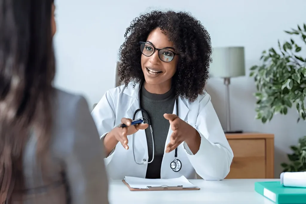 Doctor consulting with a patient about healthcare treatment — physical therapy billing services