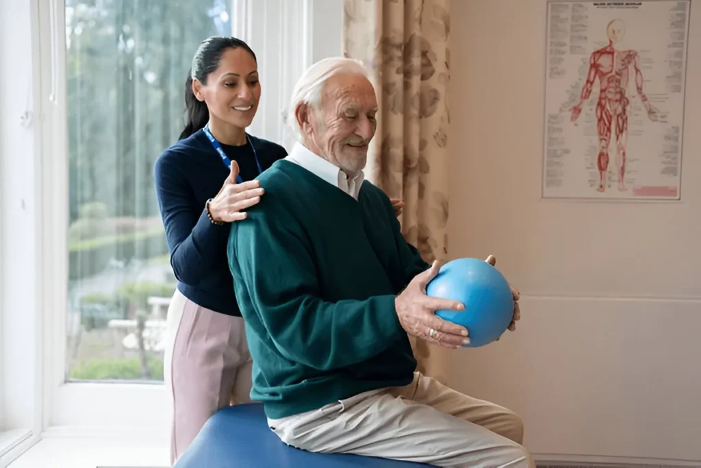 Senior man doing physical therapy exercises with a therapist’s support — Physical Medicine and Rehabilitation Billing Services.